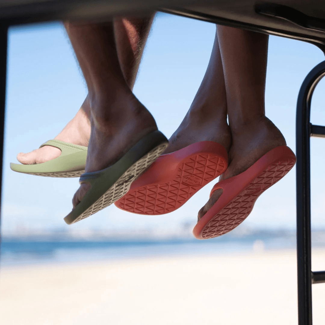 Lifestyle photo of two people wearing Lightfeet arch support thongs available from Stewarts Menswear in Mullumbimby