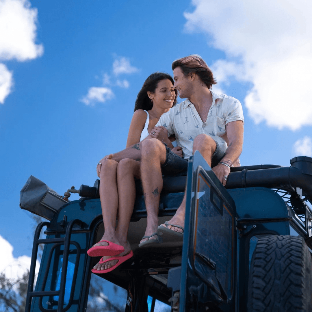 Lifestyle photo of two people wearing Lightfeet arch support thongs available from Stewarts Menswear in Mullumbimby
