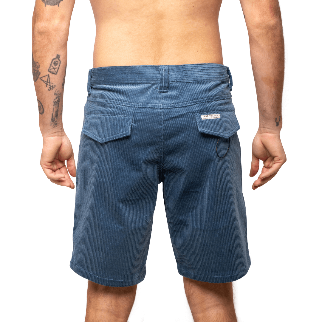 Stewarts Menswear Liive Apparel Falcon corduroy walkshort. Perfect for casual days, these shorts pair seamlessly with your favourite t-shirts, polos, or button-downs. Wear them with sneakers for a relaxed look or dress them up with loafers for a smart-casual occasion.  Colour is called Navy, but it is lighter, more like a stone blue colour. Back View showing flap pockets.