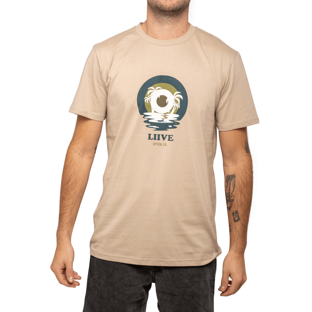 Stewarts Menswear Liive Vision Apparel Islander Tee-shirt. Liive Vision Chalky Tee-Shirt is a Summer essential that pairs seamlessly with Liive's latest boardshorts and corduroy shorts. Pistachio colour t-shirt. Triple circle decal on centre chest with palm trees on top.