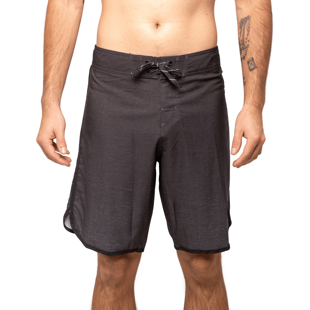 Stewarts Menswear Liive Vision Apparel Vague Boardshort. Trendy gradient colour design.   Fitted waist with drawcord, back patch pocket with velcro closure and keep loop in the back pocket. Dark black waistband with gradient black body. Scalloped leg with black piping and black pocket on back. Front View.