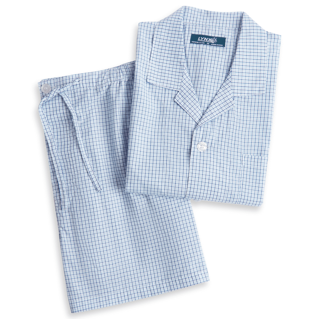 Stewarts Menswear Lynx Short pyjama set. Photo shows flat lay of men's short pyjama set. Colour is called "off the grid blue," a white base with blue grid check all over.