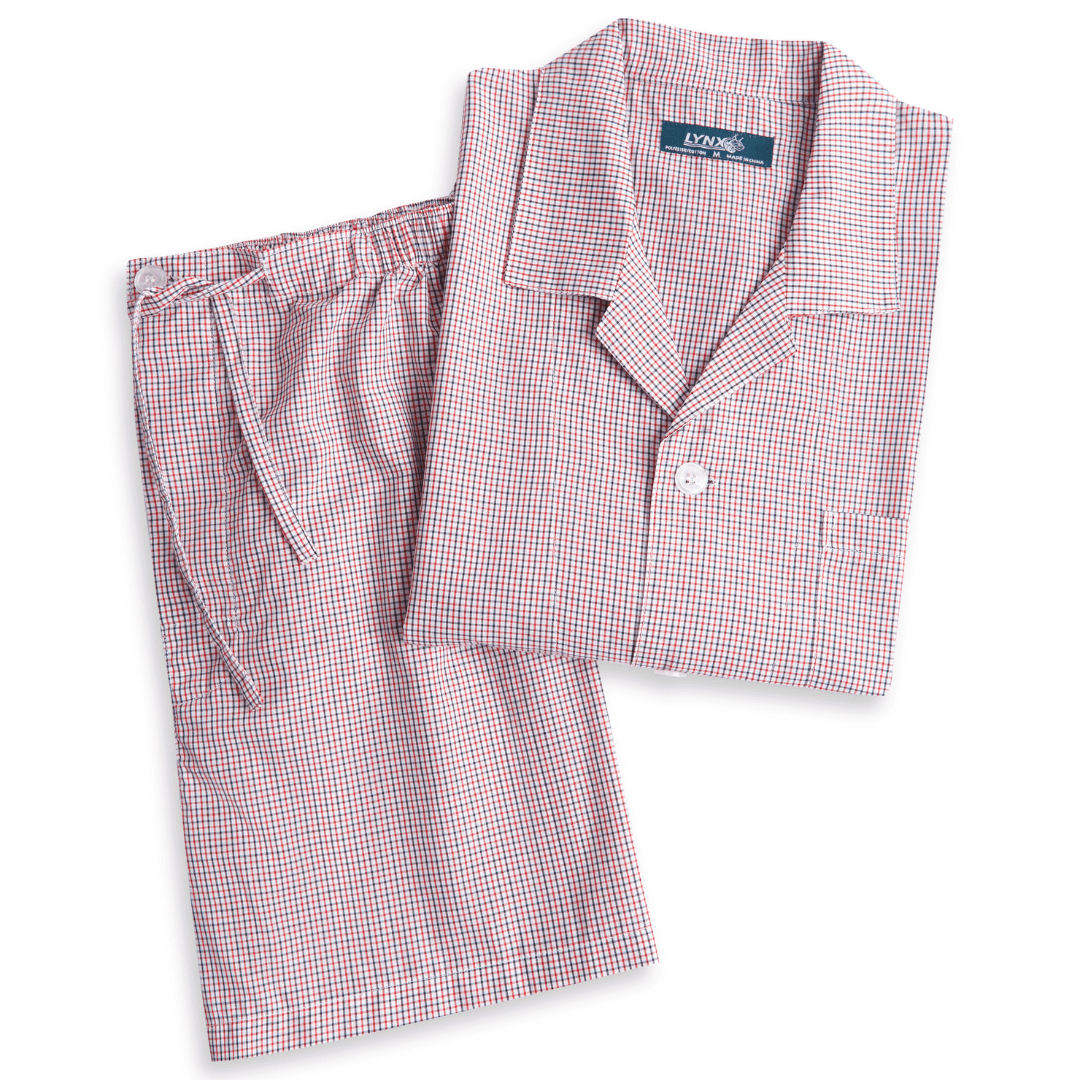 Stewarts Menswear Lynx Short pyjama set. Photo shows flat lay of men's short pyjama set. Colour is called "off the grid red," a white base with red grid check all over.