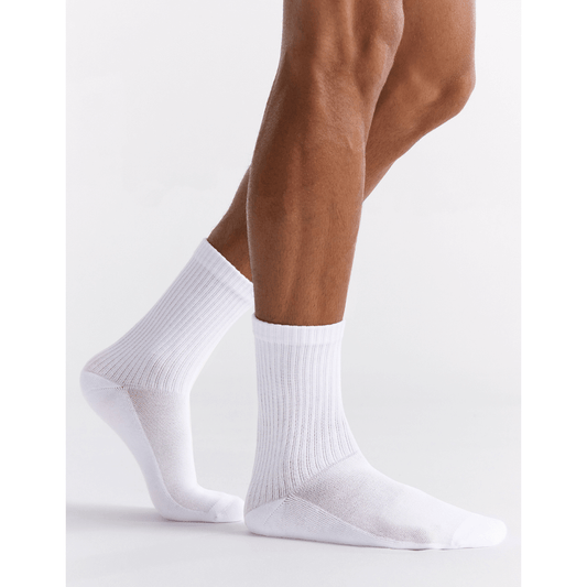 Stewarts Menswear Mullumbimby. Ambra men's active high ankle socks. Photo shows model wearing Ambra men's active high ankle socks. Colour is White.