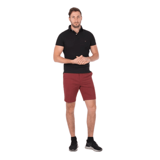 Stewarts Menswear Mullumbimby. Bob Speers active waist classic walk short. The Men's Active Waist Classic Walk Shorts are perfect for those who value style, comfort and functionality. A versatile short suitable for smart casual occasions, outdoor adventures or relaxing on the weekend. Colour is Red Brick, lifestyle photo of model wearing shorts with a polo shirt.