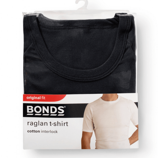 Bonds raglan t-shirt packaging with a black t-shirt on a white background. Bonds Original Raglan Tee Shirt available at Stewart's Menswear Mullumbimby. Soft cotton men's crew neck tee in basic colours.