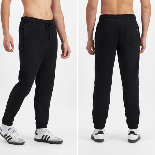 Side and back views of model wearing BONDS Originals Jogger Pant available at Stewart’s Menswear Mullumbimby. Relaxed fit men’s cotton joggers with drawcord waist and pockets.