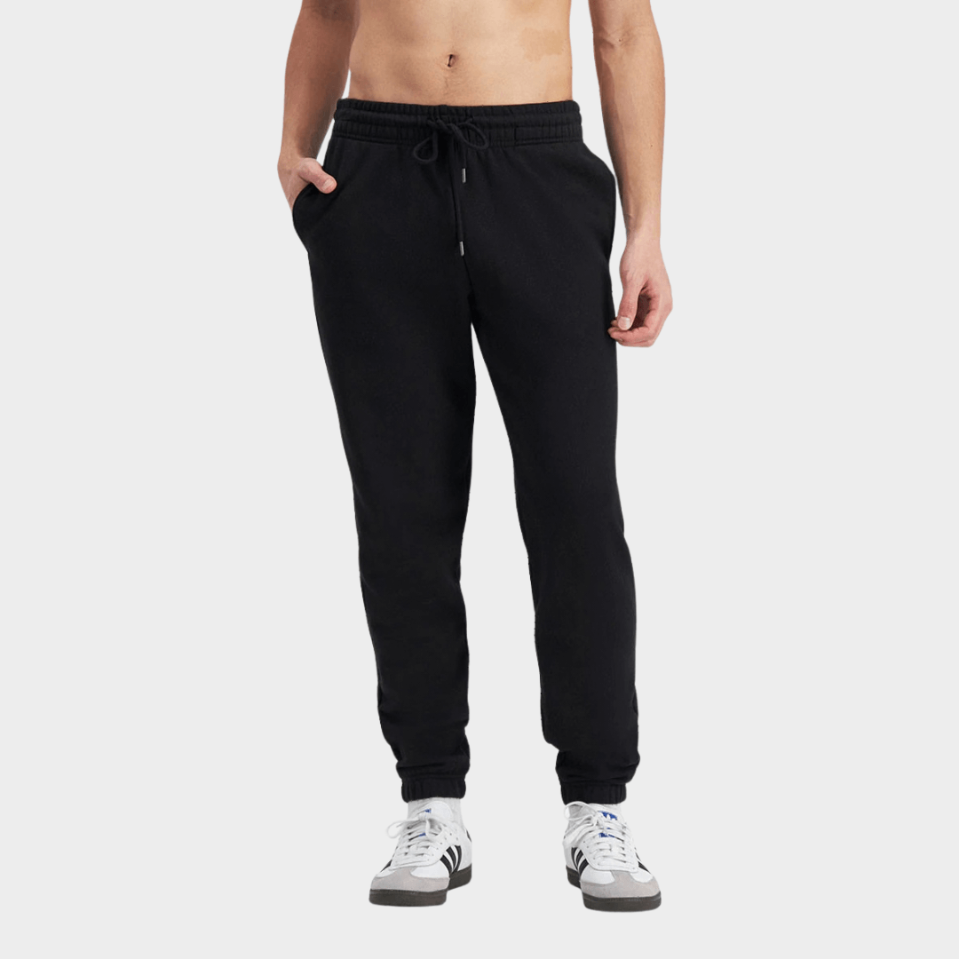 Front view of model wearing BONDS Originals Jogger Pant available at Stewart’s Menswear Mullumbimby. Relaxed fit men’s cotton joggers with drawcord waist and pockets.