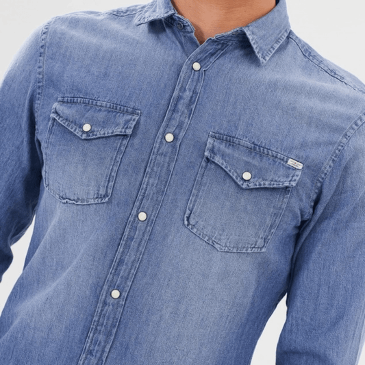 Close up view of Jack and JOnes Sheridan denim shirt in blue denim available from Stewart's Menswear, Mullumbimby.
