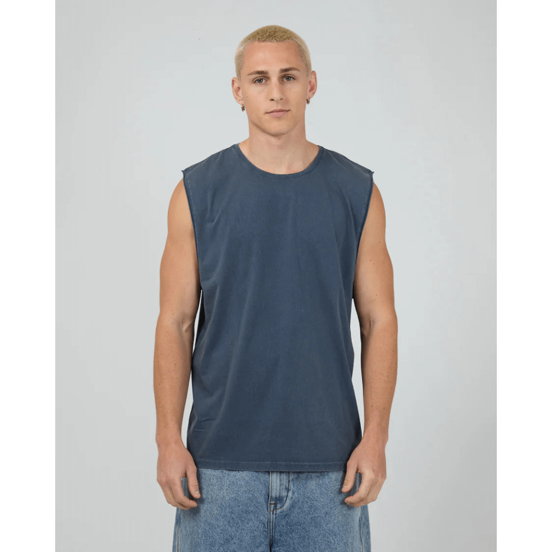 Man wearing Silent Theory basics classic muscle tee available from Stewart's Menswear in Mullumbimby. Pigment washed, navy colour, front view.