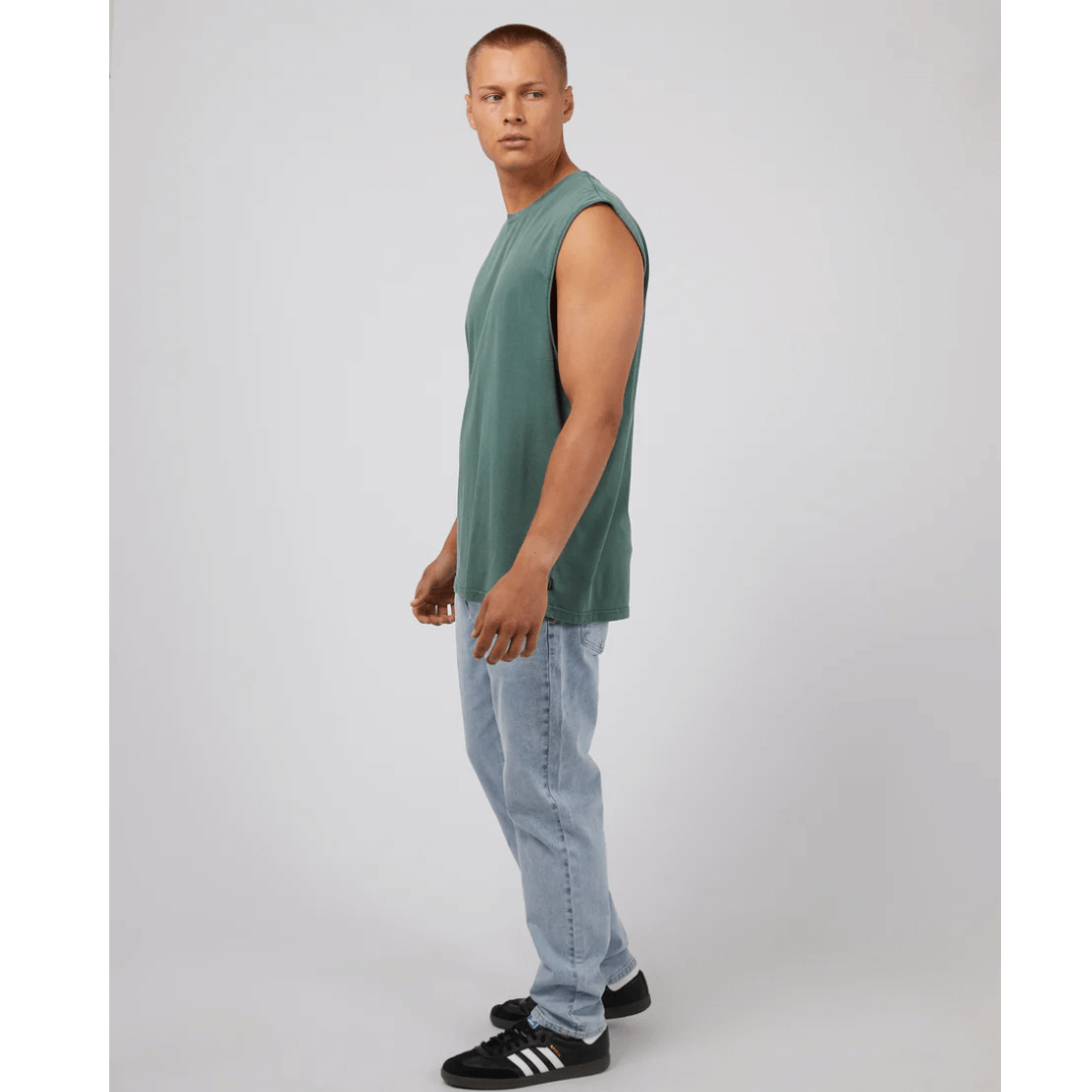 Stewart's Menswear, Mullumbimby. Silent Theory basic classic muscle tee. Photo shows model wearing Tan coloured Silent Theory Classic muscle, side view.