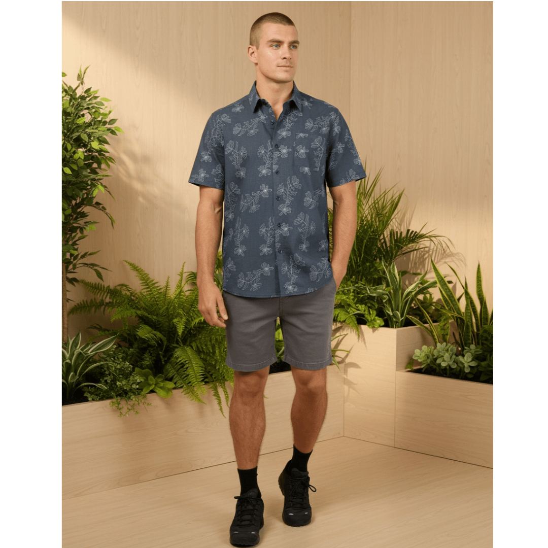 Lifestyle photo of model wearing St Goliath Blackgate Short Sleeve Shirt  available at Stewart’s Menswear Mullumbimby. Men’s relaxed-fit cotton shirt with button-down front and collared neckline.