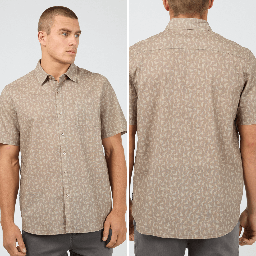 Front and back views of model wearing St Goliath Portsea Short Sleeve Shirt available at Stewart’s Menswear Mullumbimby. Men’s relaxed-fit cotton shirt with button-down front. Save $20. Mushroom colour with small cream coloured geometric print all over.