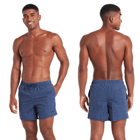 Stewart's Menswear, Mullumbimby. Photo shows model wearing Zoggs Mosman shorts in Navy Colour, both front and back views.