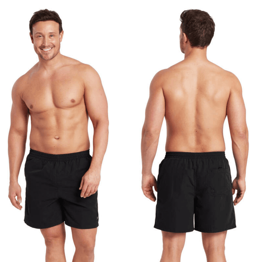 Stewart's Menswear, Mullumbimby. Photo shows front and back view of model wearing Zoggs Penrith Shorts in colour Black,.