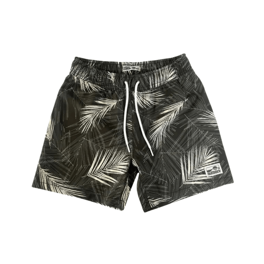 Outback Supply Co Black/white boys' boardshorts with white leaf print/black background and elastic waistband, available at Stewart's Menswear Mullumbimby.