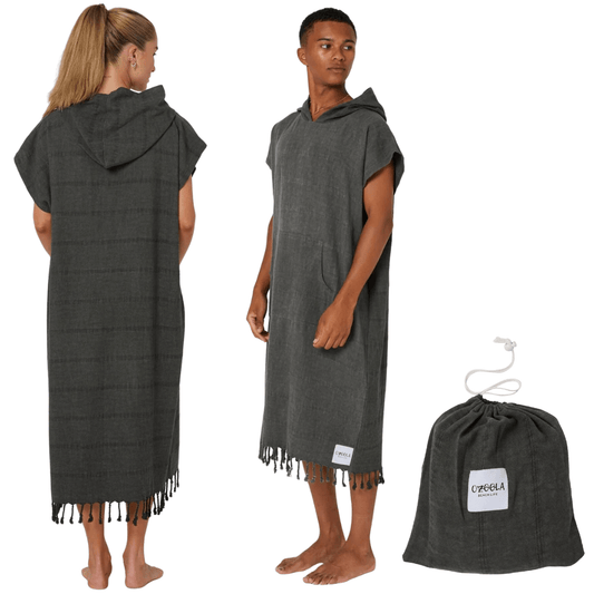 Stewarts Menswear Ozoola Surf Poncho. These surf ponchos are made from 100% Turkish Cotton which is super soft and remarkably quick drying.  One size fits all surf ponchos are both stylish and practical. They come with their own bag, which you can use to carry your poncho to the beach and keep your gear in one place while you're surfing.  Colour is Charcoal