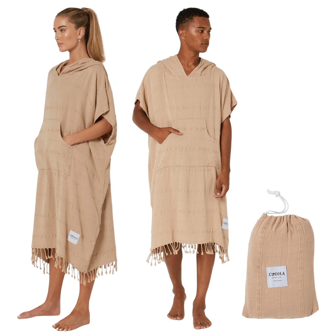 Stewarts Menswear Ozoola Surf Poncho. These surf ponchos are made from 100% Turkish Cotton which is super soft and remarkably quick drying.  One size fits all surf ponchos are both stylish and practical. They come with their own bag, which you can use to carry your poncho to the beach and keep your gear in one place while you're surfing.  Colour is Sand.