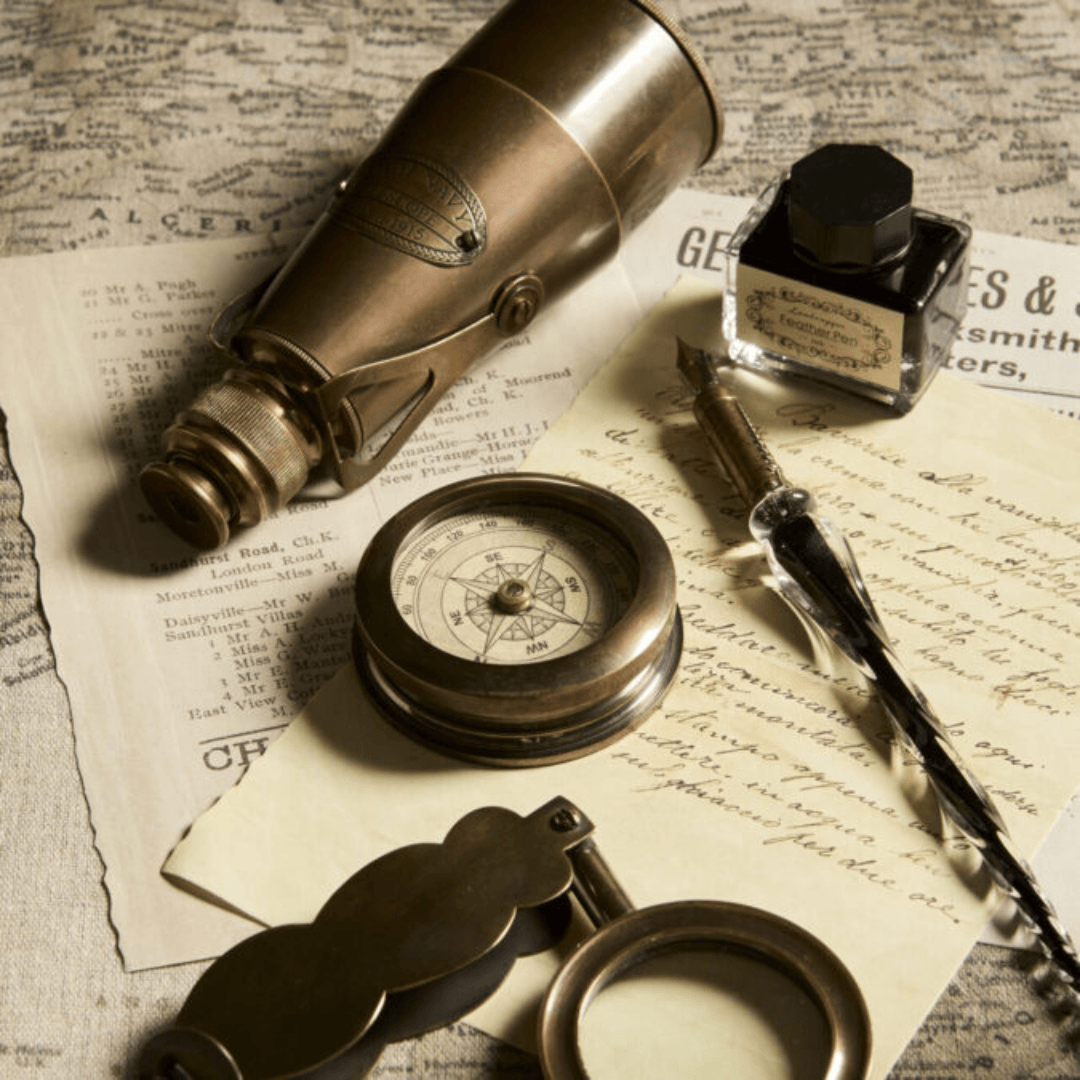 Lifestyle photo of handmade Folding Magnifier in brass and glass with a folding pocket design, available at Stewart's Menswear Mullumbimby.