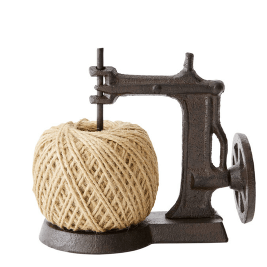 Spinning Yarn Dispenser styled as an antique sewing machine, made from iron, available at Stewart's Menswear Mullumbimby.