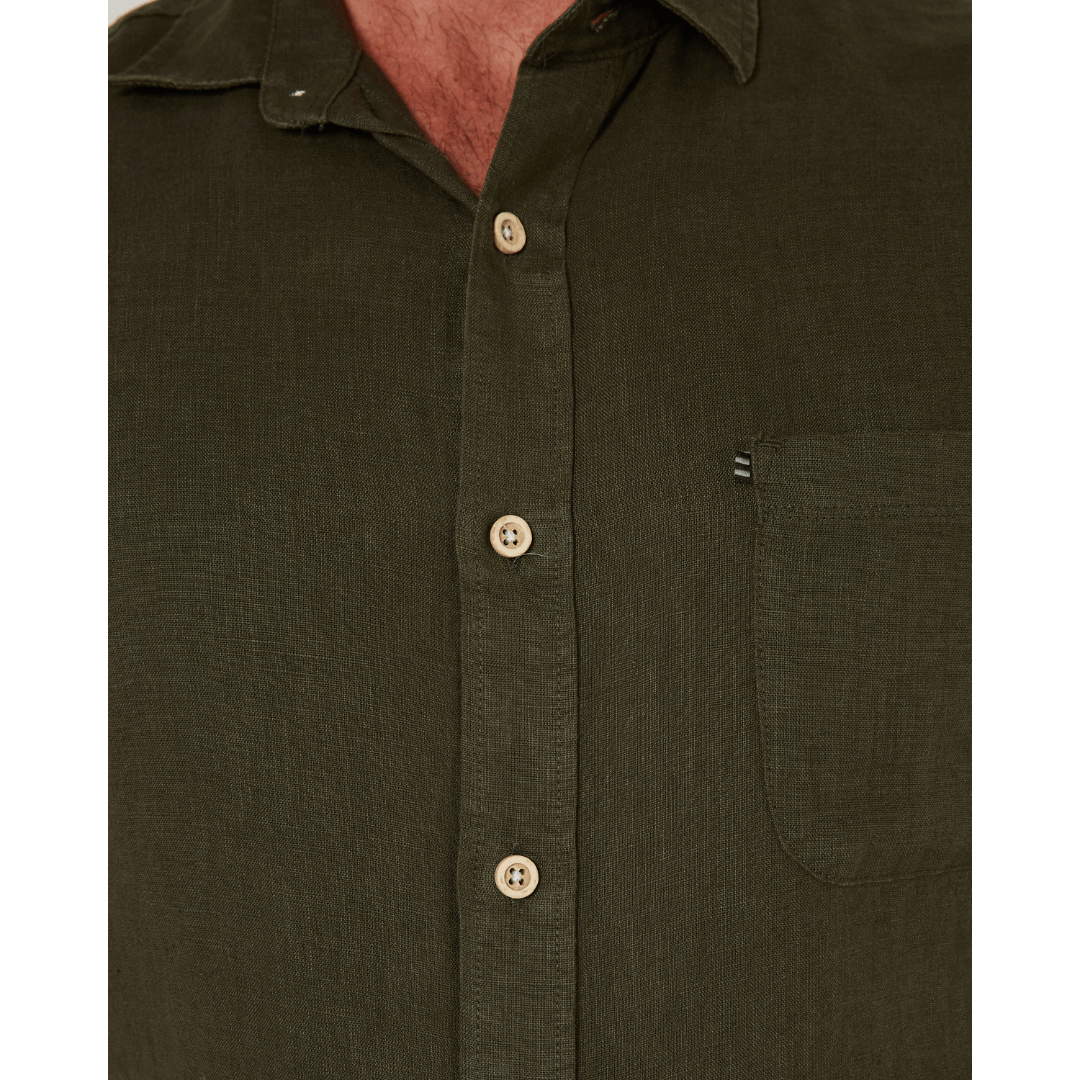 Close up view of men's Pilbara Collection by Ritemate Workwear Classic Fit Long Sleeve Linen Shirt in Olive with Windmill embroidery detail, available at Stewart's Menswear Mullumbimby.