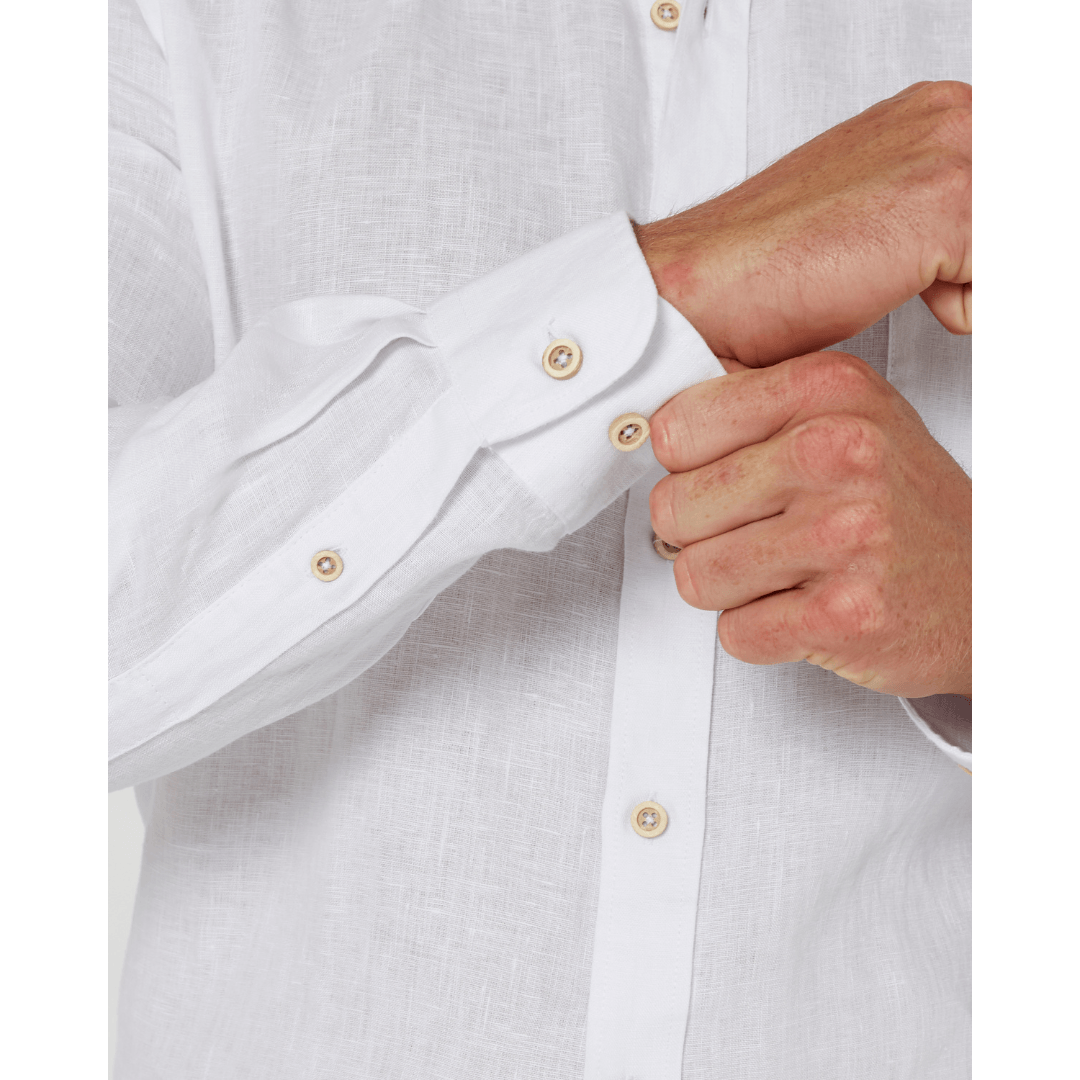 Cuff detail of Men's Pilbara Collection by Ritemate Workwear Classic Fit Long Sleeve Linen Shirt in white with Windmill embroidery detail, available at Stewart's Menswear Mullumbimby.