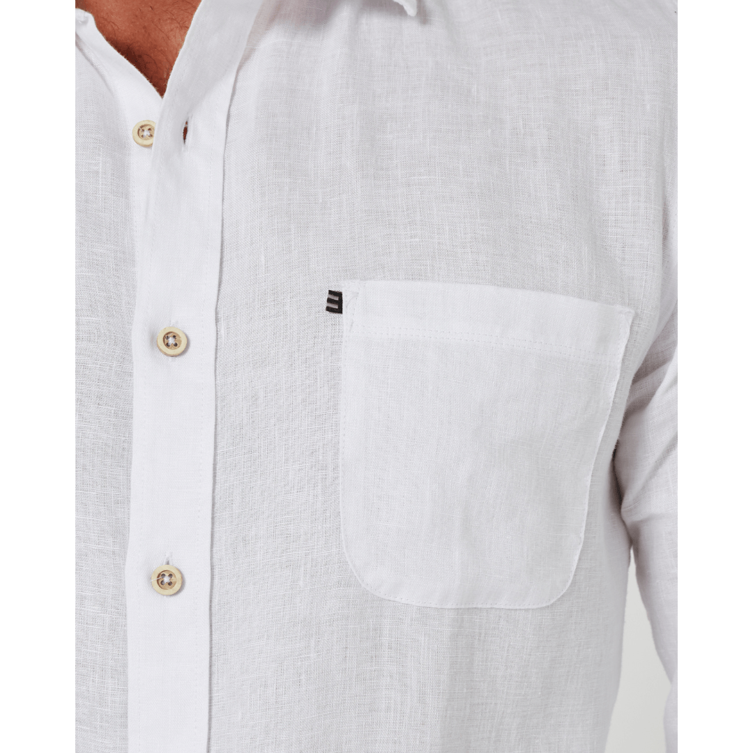 Close up view of men's Pilbara Collection by Ritemate Workwear Classic Fit Long Sleeve Linen Shirt in white with Windmill embroidery detail, available at Stewart's Menswear Mullumbimby.