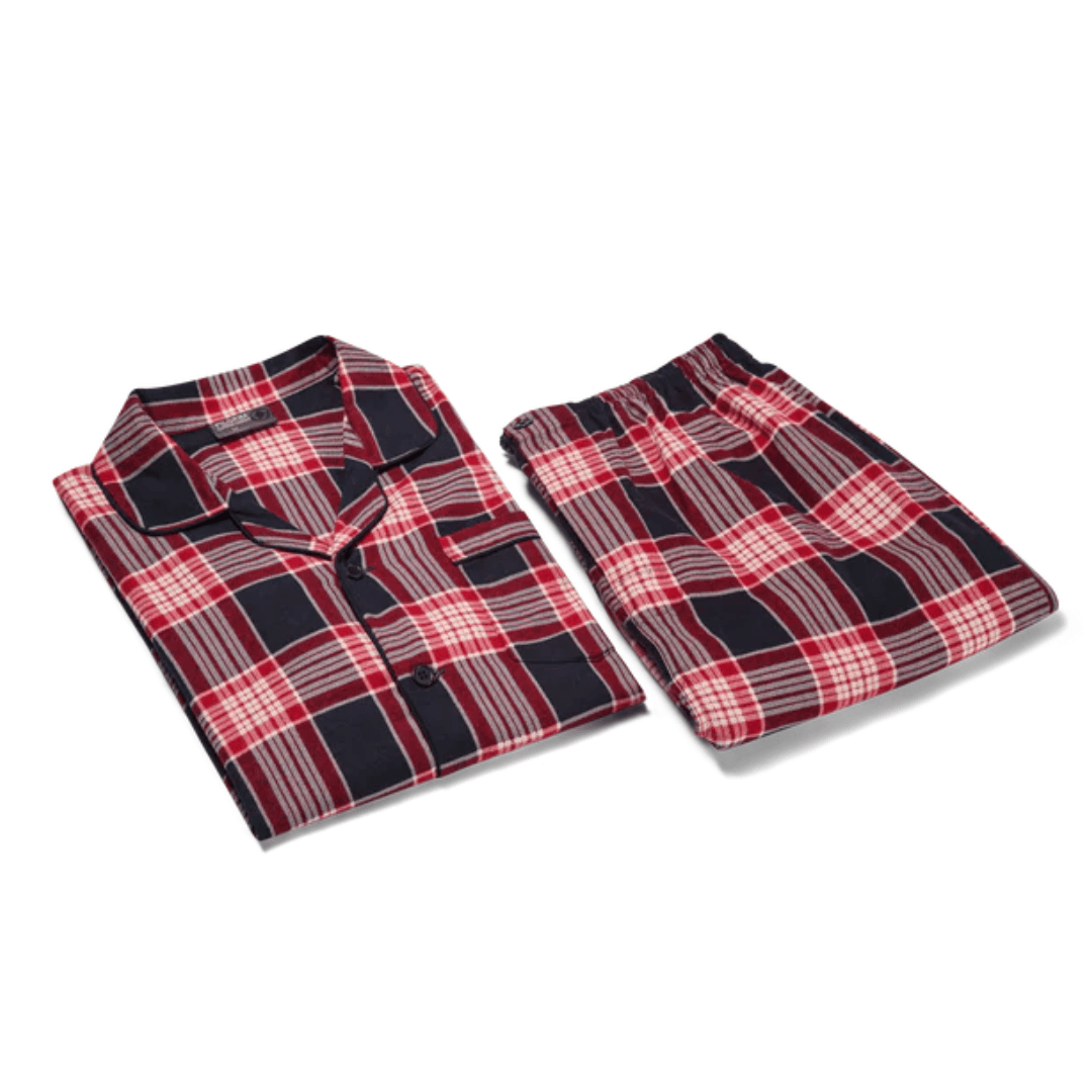 A folded set of red checkered men's long sleeve 100% cotton flannelette pyjamas available at Stewart's Menswear Mullumbimby