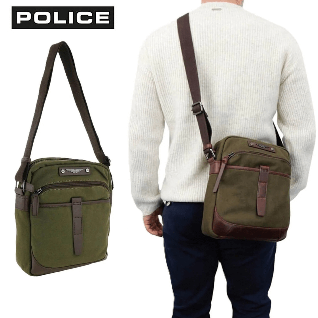 Lifestyle photo of model wearing olive coloured Police canvas cross body bag available from Stewarts Menswear, Mullumbimby. 