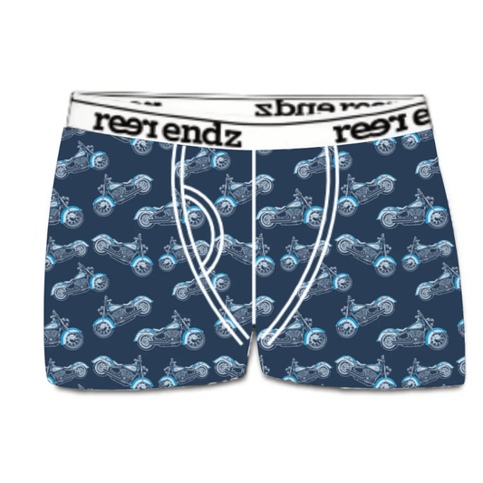 A pair of men's boxer briefs featuring an allover pattern of blue and white motorcycles on a dark navy background, with a white waistband printed with the brand name 'reer endz'. Reer Endz organic cotton underwear (Liv for the ride) available from Stewart's Menswear in Mullumbimby.