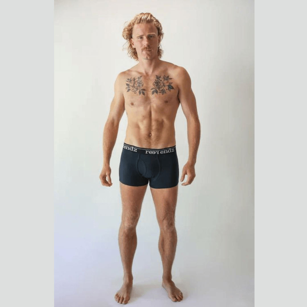 Stewarts Menswear Reer Endz Underwear. Made from organic cotton. Photo shows model wearing navy trunks. Front view.