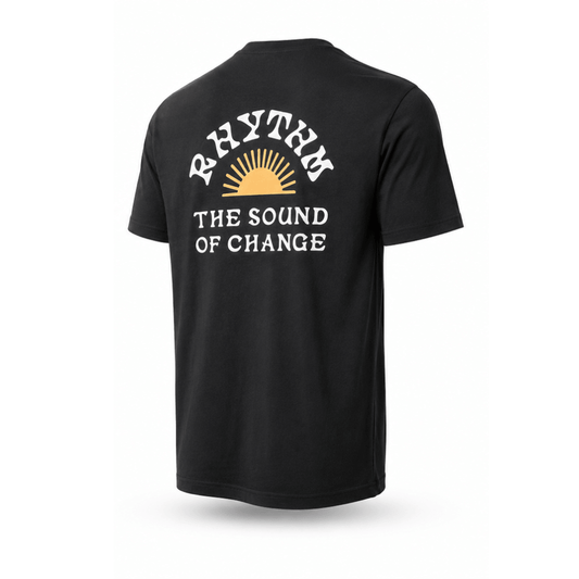 Stewarts Menswear, Mullumbimby. Rhythm Livin Awake Tee-shirt. Colour is black. Photo shows  Rhythm Awake T-shirt, back view. Rhythm logo with sun print and the words "The sound of change"