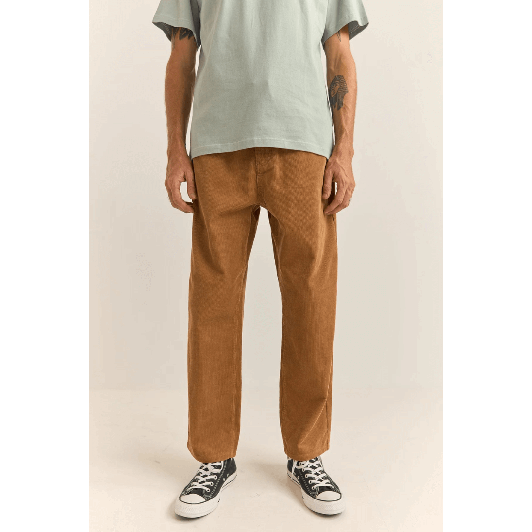 Stewarts Menswear Rhythm Livin Cord Jeans. Photo shows model wearing Rhythm Cord Jeans. Colour is incense (Caramel colour).