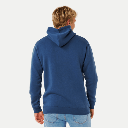 Man wearing a blue hoodie on a white background. Back view of Rip Curl Classic Surf Hoodie in light navy available from Stewart's Menswear, Mullumbimby.
