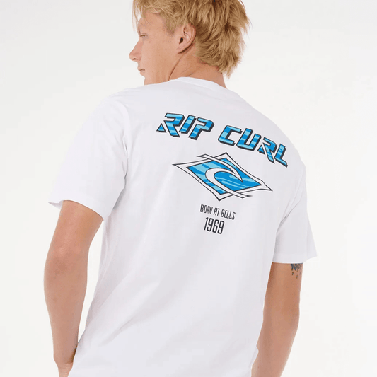 Stewarts Menswear, Mullumbimby. Photo shows model wearing Rip Curl Fade Out Icon Tee. Back view. White tee with Blue Rip Curl branding.