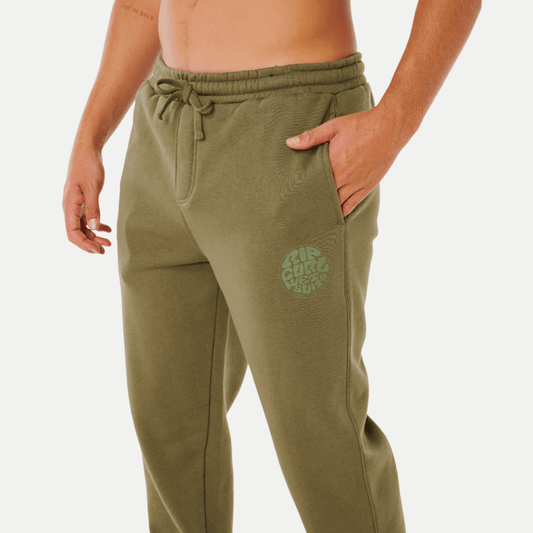 Olive green sweatpants shownclose up on a white background. Rip Curl Icons of Surf trackpants in surplus green available from Stewart's Menswear, Mullumbimby