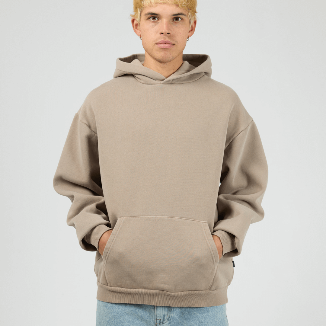Front view cement coloured Silent Theory Box Hoodie with hood and kangaroo pocket, available at Stewart’s Menswear Mullumbimby.