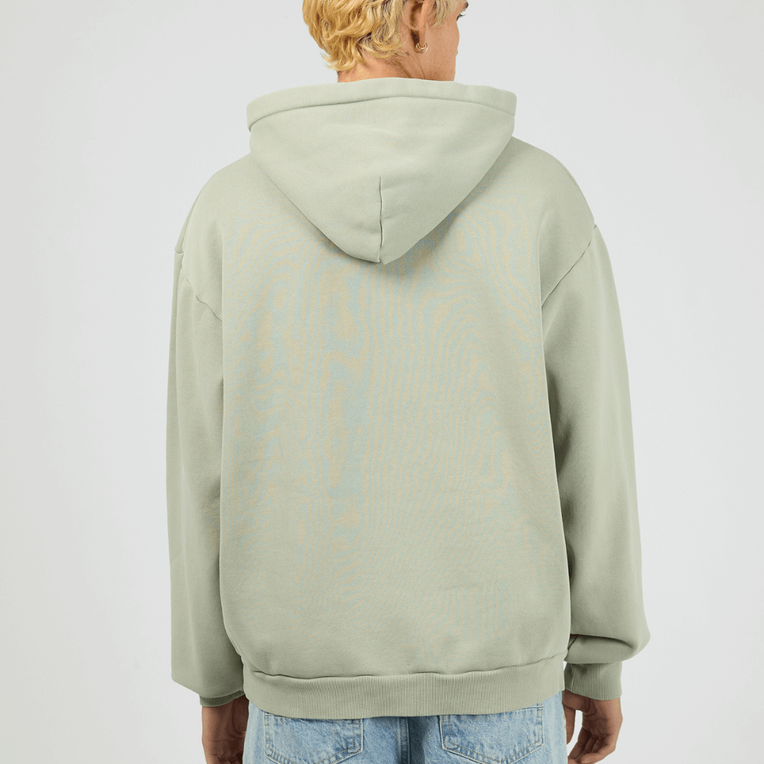 Back view of sage coloured Silent Theory Box Hoodie with hood and kangaroo pocket, available at Stewart’s Menswear Mullumbimby.