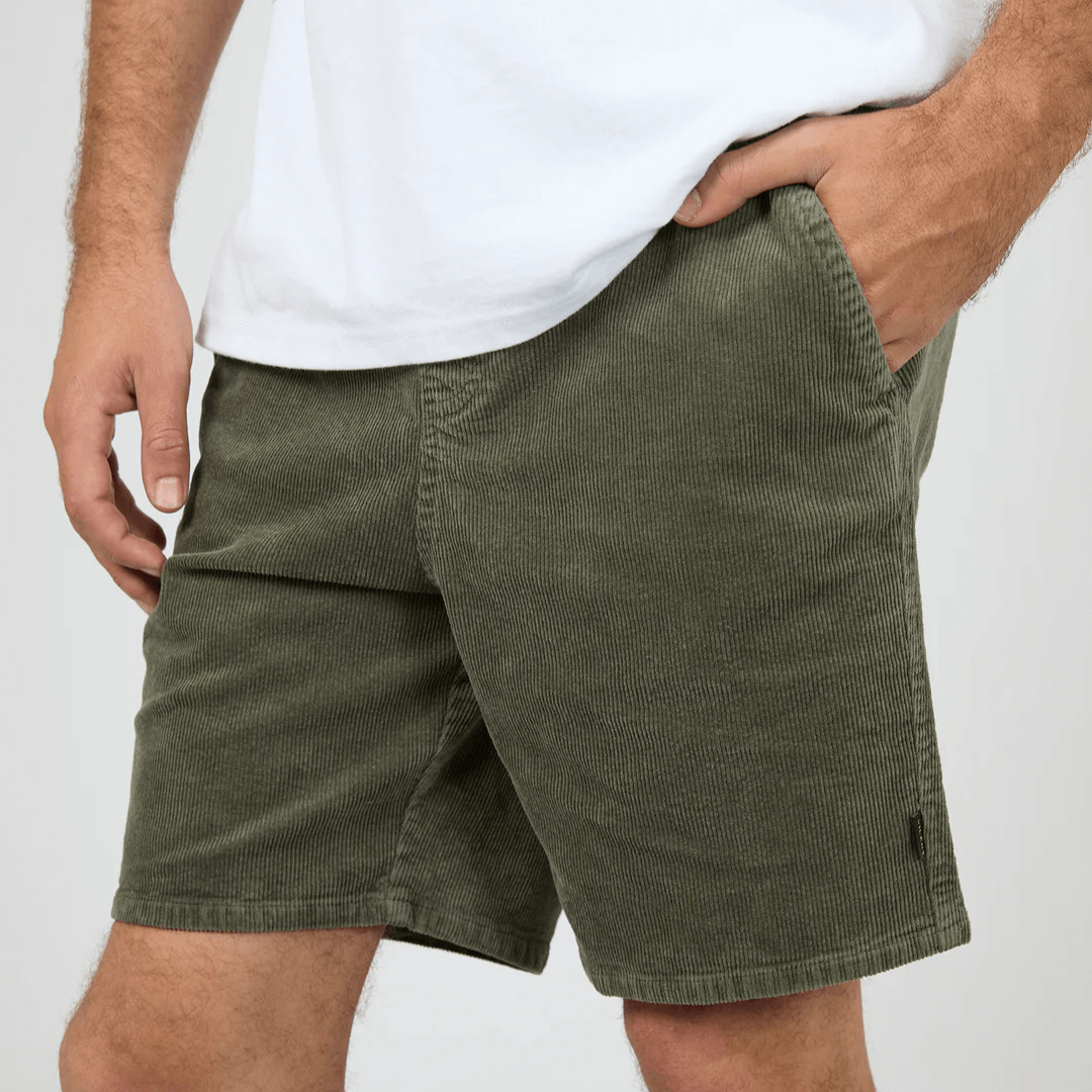 Close up view of silent Theory Cord Short available at Stewart’s Menswear Mullumbimby. Men’s cotton corduroy shorts with drawcord waist and relaxed fit.