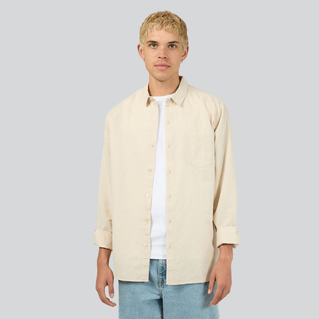Silent Theory Long Sleeve Linen Shirt in relaxed natural linen with collared neckline and front pocket, available at Stewart's Menswear Mullumbimby.
