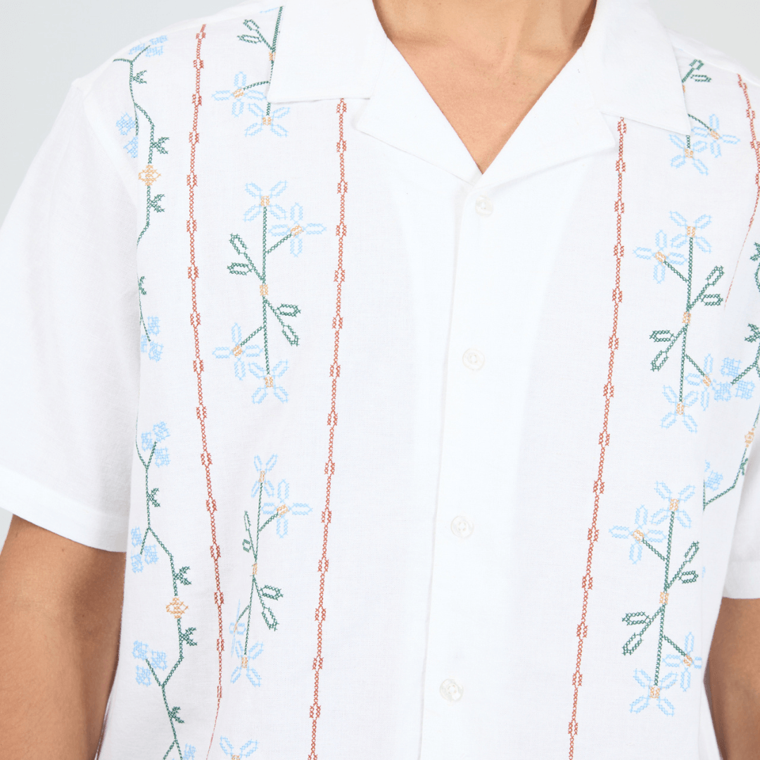 Silent Theory Theo Short Sleeve Shirt in white with blue and green floral embroidery and rust linear detailing, available at Stewart's Menswear Mullumbimby.