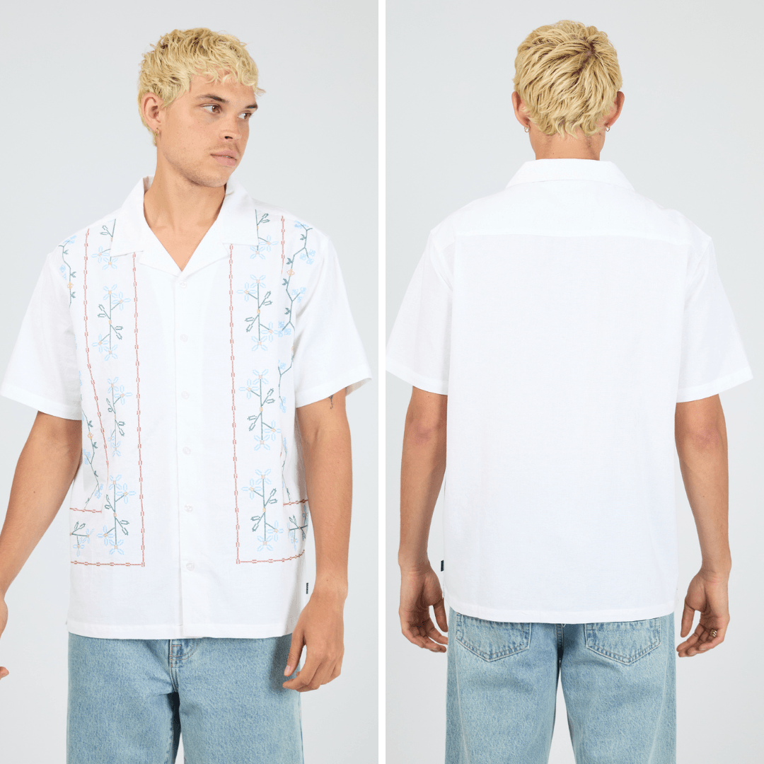 Silent Theory Theo Short Sleeve Shirt in white with blue and green floral embroidery and rust linear detailing, available at Stewart's Menswear Mullumbimby.