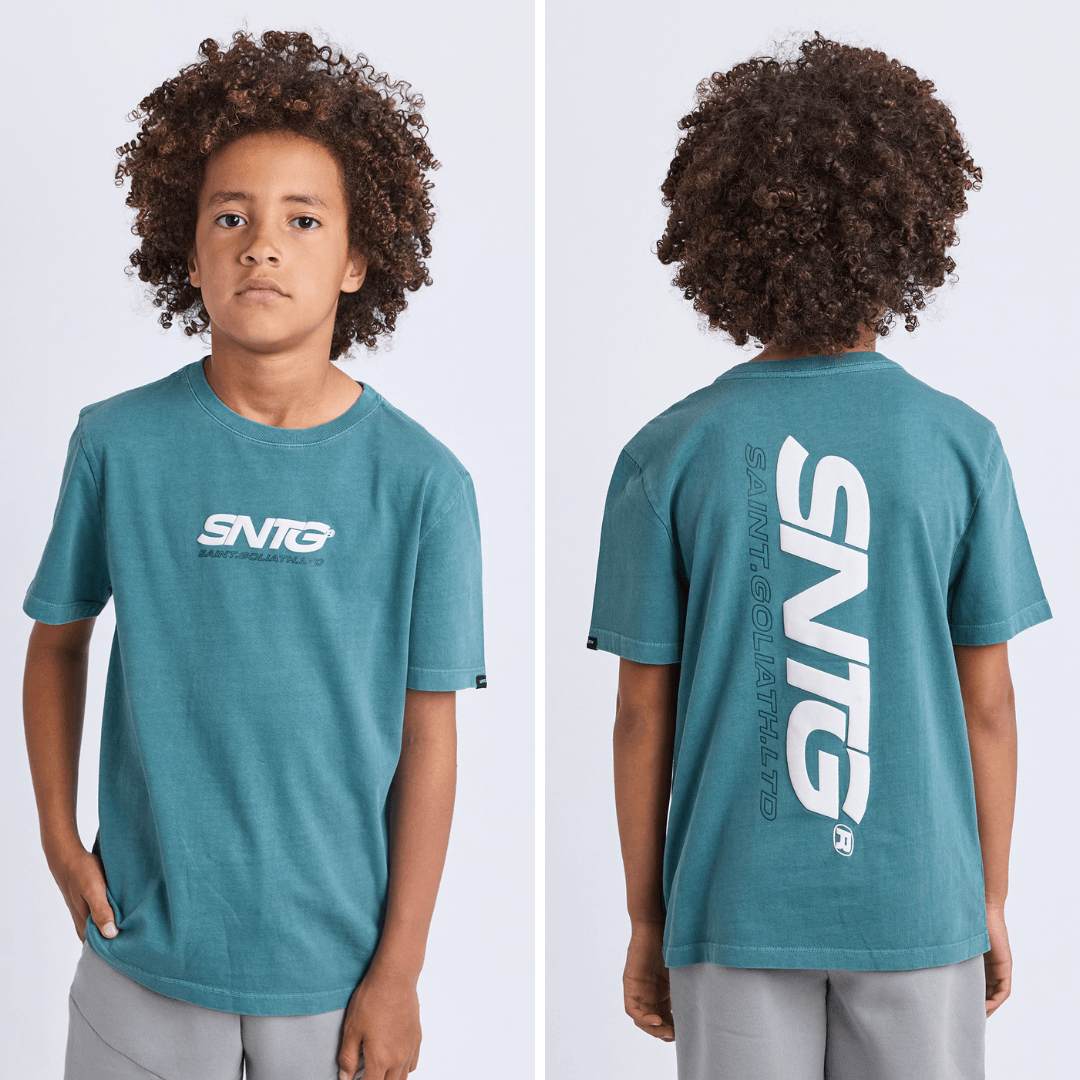 (front): St Goliath Boys Challenger Tee in forest with white SNTG chest logo, a relaxed fit boys' t-shirt available at Stewart's Menswear Mullumbimby.

(back): Back view of the St Goliath Boys Challenger Tee in forest with large vertical white SNTG logo, available at Stewart's Menswear Mullumbimby.