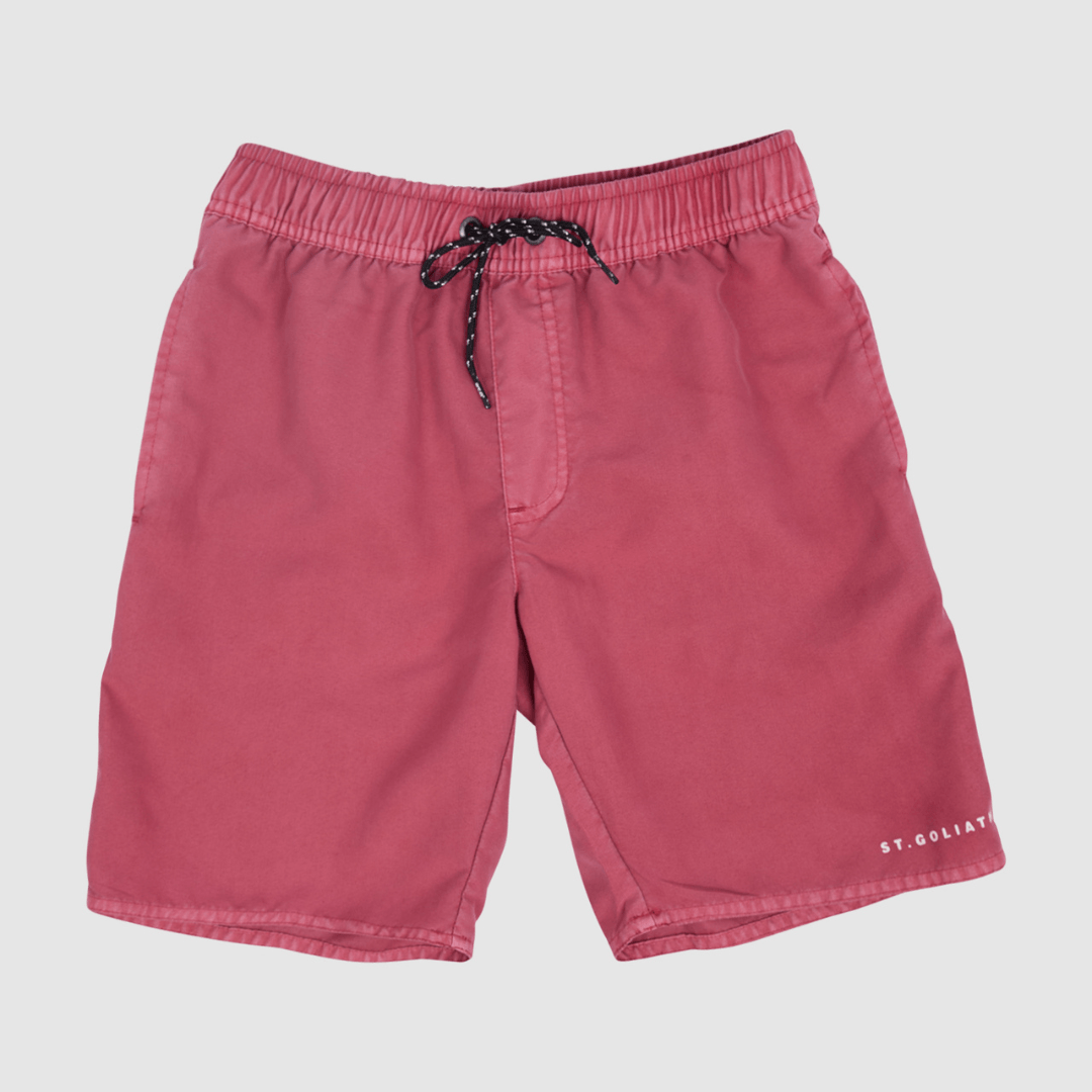 Flatlay of St Goliath Boys Illusion Short in washed red with elastic waist and small leg logo, quick drying kids' shorts available at Stewart's Menswear Mullumbimby.