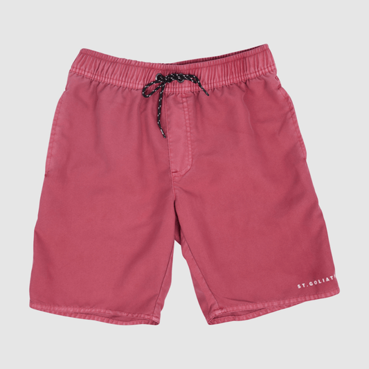 Flatlay of St Goliath Boys Illusion Short in washed red with elastic waist and small leg logo, quick drying kids' shorts available at Stewart's Menswear Mullumbimby.