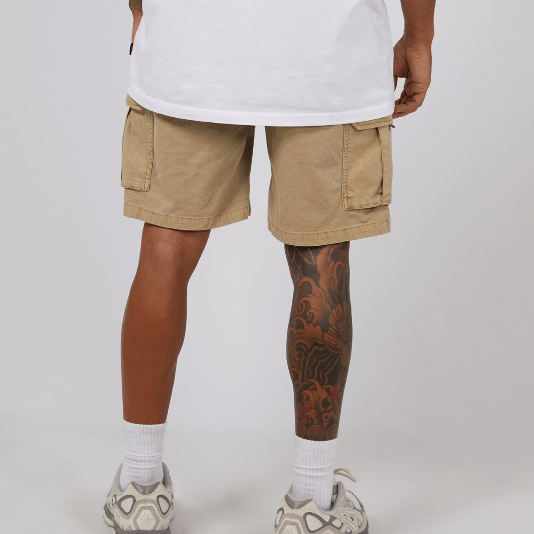 stewarts Menswear St Goliath Ripstop Cargo Short. Colour is sand. Photo shows back view of model wearing St Goliath Ripstop Cargo Short.