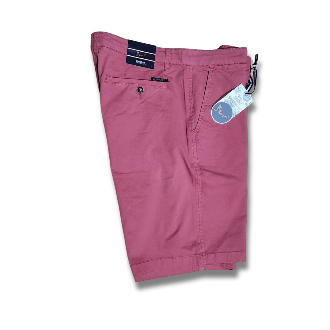 Stewarts Menswear Le Short stretch cotton shorts. Made with a blend of 97% cotton and 3% spandex, they offer a comfortable and flexible fit that moves with you throughout the day.   These shorts come in a range of classic colours, making them easy to pair with your favourite summer shirts, and with a range of sizes available, there is a perfect fit for every body type. Colour is Melon, Side View.