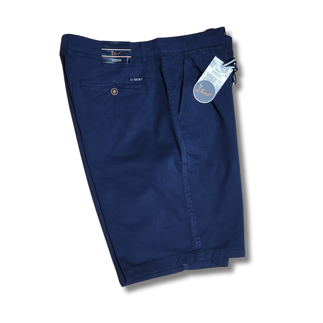 Stewarts Menswear Le Short stretch cotton shorts. Made with a blend of 97% cotton and 3% spandex, they offer a comfortable and flexible fit that moves with you throughout the day.   These shorts come in a range of classic colours, making them easy to pair with your favourite summer shirts, and with a range of sizes available, there is a perfect fit for every body type. Colour is Navy, side View.