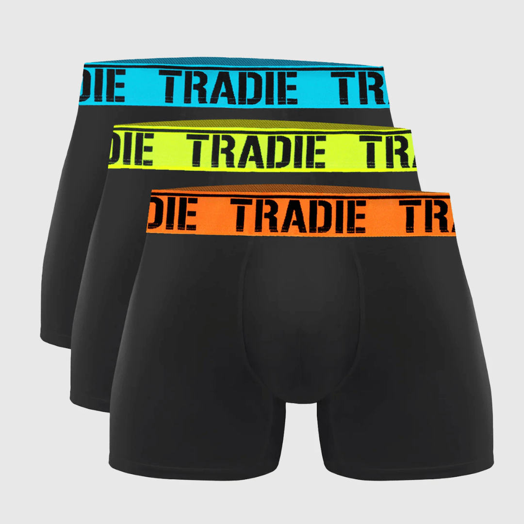 Tradie 3 Pack Fitted Trunks available at Stewart’s Menswear Mullumbimby. Men’s cotton stretch trunk underwear with fully lined pouch and everyday fit. 3 x black trunks each with different colour fluro elastic band.