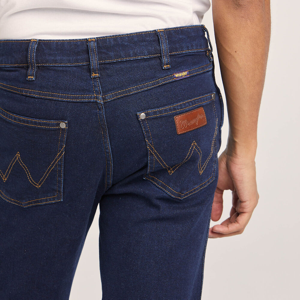 Stewarts Menswear Wrangler Classics straight Jeans. Colour is Original Rinse. Photo shows model wearing Wrangler jeans close up back view.